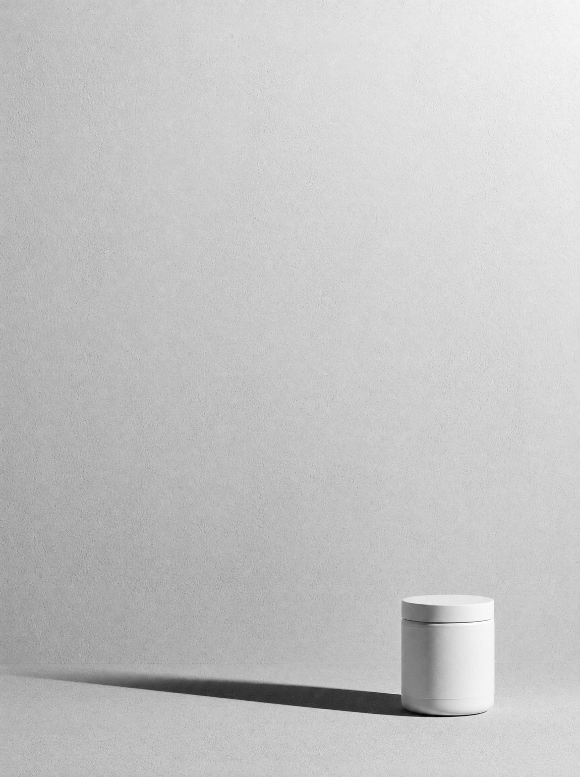A single jar on plaster